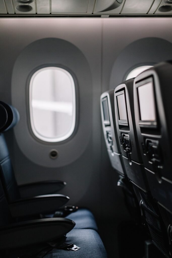 plane, seats, window, aviation, aircraft, commercial, travel, airport, air travel, boeing, phone wallpaper, adventure, aesthetic wallpaper, iphone wallpaper